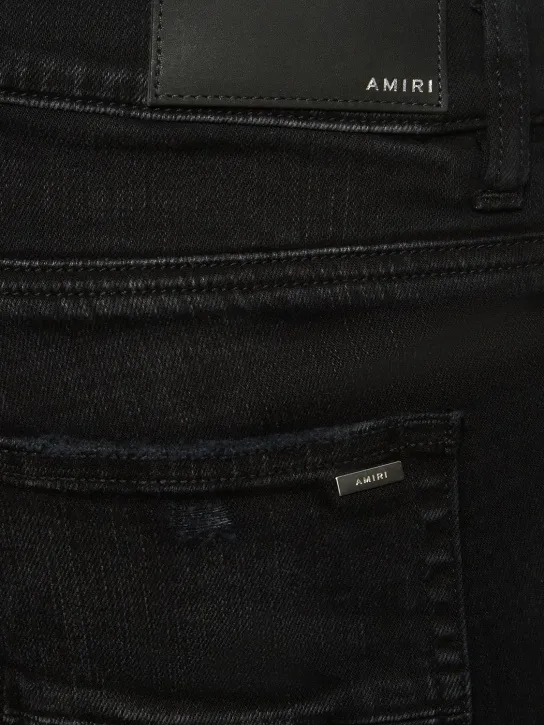 Amiri   Amiri logo distressed jeans 