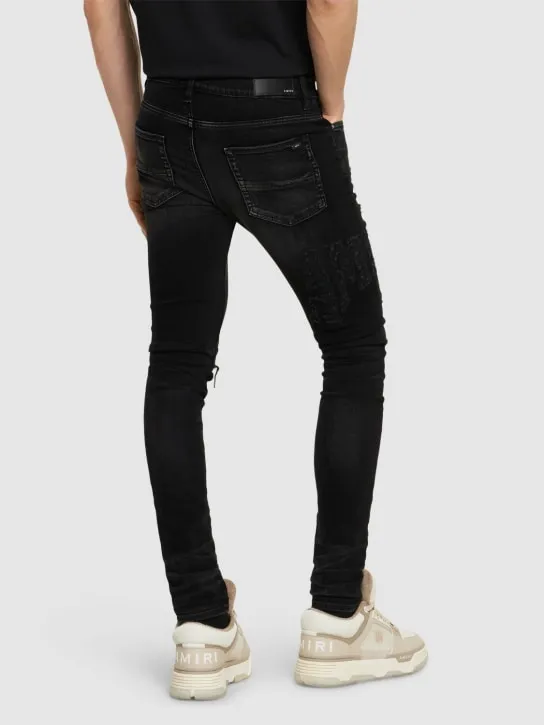 Amiri   Amiri logo distressed jeans 