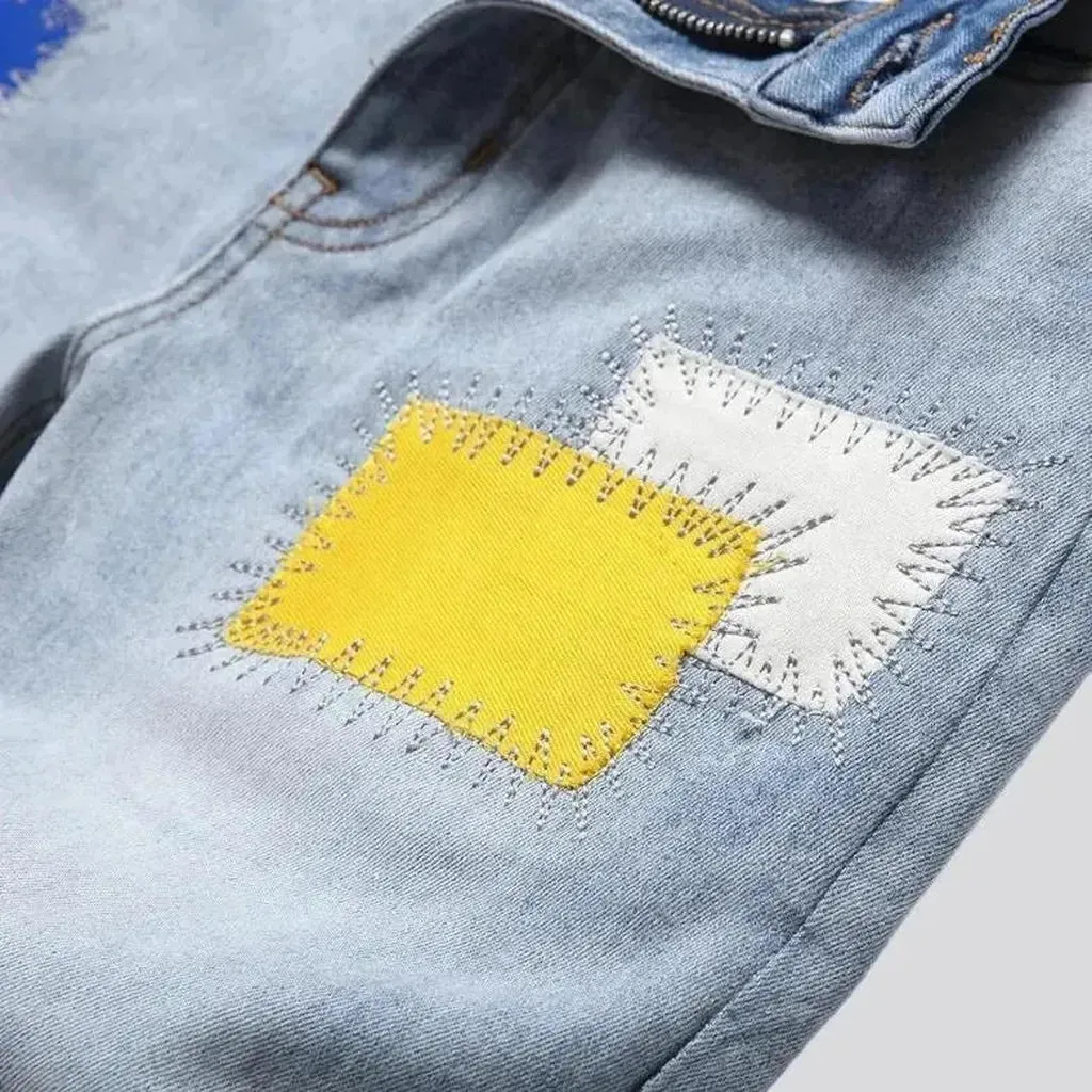 Light-wash color-patches jeans