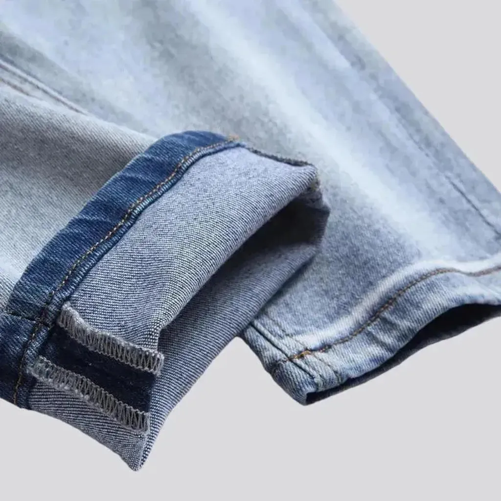 Light-wash color-patches jeans
