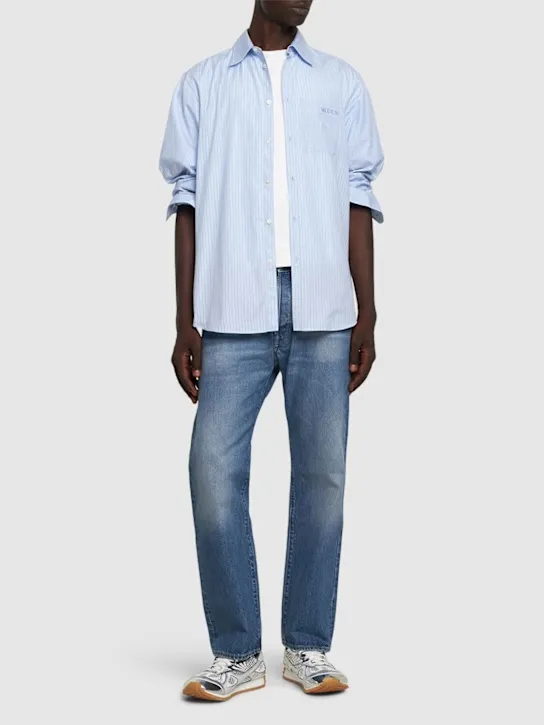 Valentino   Dirty medium wash 5 pocket jeans 